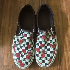 Checkered rose vans.
